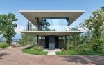 Teca House | Architecture by Federico Delrosso Architects. Item composed of wood & stone