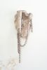 "Afra" Ceramic wall sculpture with chains | Wall Hangings by Asmaa Aman Studio. Item made of ceramic works with boho & contemporary style