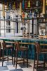 Collector’s Marigold Overhead Bar Shelving | Storage by Amuneal | Keswick Hall in Keswick. Item made of metal & glass