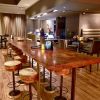 Solid Black Walnut Slab Table | Dining Table in Tables by DI VITA Style | IPIC Theaters in Redmond. Item made of walnut with steel