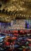 Custom Curved Collectors Back Bar Island with Mesh | Shelving in Storage by Amuneal | Vesper Bar in Las Vegas. Item composed of metal and glass
