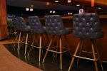 Button Tufted Bar Stools - 7024 | Chairs by Richardson Seating Corporation | 10pin Bowling Lounge in Chicago. Item made of leather