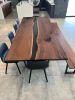 Walnut River Dining Table with Matching Bench | Tables by Chagrin Valley Custom Furniture. Item composed of walnut and steel in contemporary or modern style