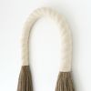 Jute Arch- Ivory | Wall Sculpture in Wall Hangings by YASHI DESIGNS | Hyatt Regency Irvine in Irvine. Item composed of cotton compatible with mid century modern and contemporary style