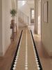 Handwoven Woolen Brown Runner Rug | Rugs by Evergreen Carpets. Item composed of wool in boho or minimalism style