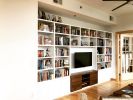 Book display / Media cabinetry | Furniture by Heirloom Custom Woodworks LLC | The Legacy Condominiums in Minneapolis