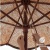 A large natural-fiber patio umbrella with a black base stan | Ornament in Decorative Objects by GoldencoirVietNam LLC. Item made of wood with fiber works with boho & country & farmhouse style