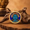 Handcrafted Green Tara Thangka Gold Pendant Amulet Jewelry | Ornament in Decorative Objects by Dynasty Artisan. Item made of metal works with contemporary & eclectic & maximalism style