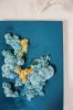 Blue and yellow corals II | Embroidery in Wall Hangings by Mariana Baertl. Item made of canvas works with boho & coastal style