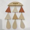 Ceramic wall hanging with decorative wood design | Wall Sculpture in Wall Hangings by Heidi Anderson HASTUDIO. Item composed of wood and ceramic