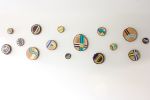 Painted Wood Slices | Mixed Media by Cassandra Smith | Allspring Global Investments in Milwaukee. Item made of wood compatible with boho and contemporary style