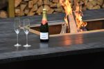 Low, XXL outdoor table with open fire pit. | Picnic Table in Tables by Craft-B. Item composed of wood and metal