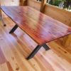 Red Cedar table with metal X base | Dining Table in Tables by Gill CC Woodworks. Item made of wood with metal