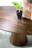 Walnut Oval dining table with conical base | Tables by LIRIO Design House. Item composed of oak wood in minimalism or mid century modern style