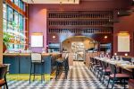 Collector's Bar Shelving | Storage by Amuneal | Lucian Books and Wine in Atlanta. Item made of wood with brass