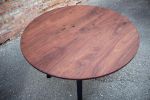 Round Walnut Mid-Century Modern Table | Dining Table in Tables by Hazel Oak Farms. Item made of oak wood with steel works with minimalism & country & farmhouse style