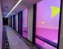 Illuminated Window Mural, Modera Residences Atlanta | Glasswork in Wall Treatments by Ryan Coleman | Modera Reynoldstown in Atlanta. Item composed of glass and synthetic