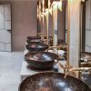 Round Washbasins | Water Fixtures by Kreoo | Muscat International Airport in Muscat. Item composed of marble