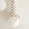 Fiber Lamp Sconce | French Macrame handweave light sculpture | Sconces by Light and Fiber. Item composed of cotton and metal in boho or contemporary style