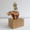 "Rhino with chairs" | Sculptures by MARCANTONIO. Item composed of wood and bronze