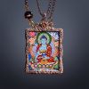 Handcrafted Medicine Buddha Thangka Amulet Pendant Art | Ornament in Decorative Objects by Dynasty Artisan. Item composed of metal in contemporary or eclectic & maximalism style