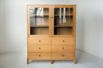 Pacific Curio Cabinet in American Cherry | Storage by Studio Moe. Item composed of wood