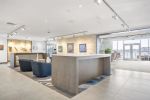 Custom Lobby Furniture (Sofas, Chairs, Tables) | Armchair in Chairs by Greg Sheres | Clippership Apartments on the Wharf in Boston. Item composed of fabric