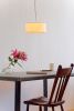 Porcelain Pendant Discus | Pendants by Bergontwerp. Item composed of fabric & ceramic
