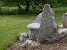 Boulder Seat | Public Sculptures by Jim Sardonis. Item made of granite
