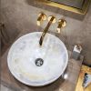Round Washbasins | Water Fixtures by Kreoo | Muscat International Airport in Muscat. Item composed of stone