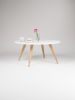 FINN 4 - White round coffee table, with solid oak legs | Tables by Mo Woodwork | Stalowa Wola in Stalowa Wola. Item made of oak wood works with minimalism & mid century modern style