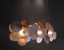 Limpets Bar 3 | Pendants by Fragiskos Bitros. Item composed of wood and metal
