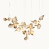 Dune 20 Cluster in Metallic Tones Pendant Light | Chandeliers by MOSS Objects. Item composed of metal in contemporary or japandi style