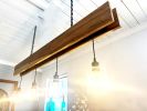 Linear 4 light chandelier in Brazillian Hickory | Chandeliers by Lakehouse Lighting