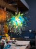 Pololena.  Hawaiian term | Chandeliers by Rick Strini. STRINI ART GLASS