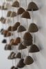 Ceramic Bells | Wall Sculpture in Wall Hangings by Kristina Kotlier. Item composed of cotton & stoneware compatible with boho and minimalism style
