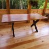 Red Cedar table with metal X base | Dining Table in Tables by Gill CC Woodworks. Item made of wood with metal