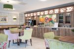 The Potting Shed - Cafe Mosaic Mural in Wantage | Art & Wall Decor by Paul Siggins - The Mosaic Studio | Elmbrook Court in Wantage. Item made of ceramic