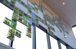 la somme des parts | Glasswork in Wall Treatments by Eric Sauvé | Bibliothèque Kirkland in Kirkland. Item composed of steel and glass