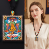 Handcrafted Yellow Zambala Thangka Pendant Garuda Amulet Art | Ornament in Decorative Objects by Dynasty Artisan. Item composed of metal compatible with contemporary and eclectic & maximalism style