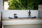 Chinese Fisherman | Public Sculptures by Anthony Smith Sculpture | Private Residence - Barcelona in Barcelona. Item composed of bronze