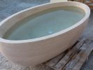 Bathtub Hand-Carved Travertine | Public Art by Babil Stone. Item composed of marble compatible with art deco style