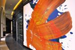 Orange Brushstroke | Murals by Organik Creative | The Kenzie at the Domain Apartments in Austin. Item made of canvas