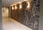 Leaf Pattern Wallcovering | Prints by Organik Creative | The McAdams Apartments in Houston. Item made of metal
