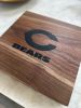 Chicago Bears Walnut Cutting Board | Serving Board in Serveware by Timberwolf Slabs. Item composed of walnut and wool