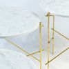 The Stilts - Travertine - Gold leaf coffee table | Tables by DFdesignLab - Nicola Di Froscia. Item made of steel with marble works with contemporary & modern style