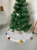 White Christmas tree skirt with colourful pompoms | Small Rug in Rugs by Anzy Home. Item composed of cotton