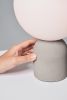 CASTLE GLO Table Lamp | Lamps by SEED Design USA. Item composed of concrete and glass