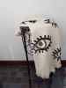 Evil Eye Throw Blanket | Linens & Bedding by Lumina Design. Item made of cotton compatible with boho and mid century modern style