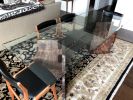 Glass Top Trestle Table | Dining Table in Tables by Zawalich Woodwork + Design. Item composed of walnut & glass